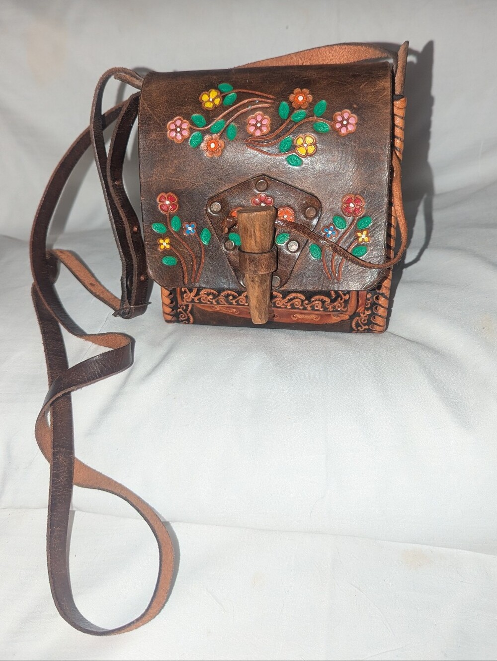 Vintage Hand-Tooled Brown Leather Crossbody Bag with Floral Accents Saddle Bag